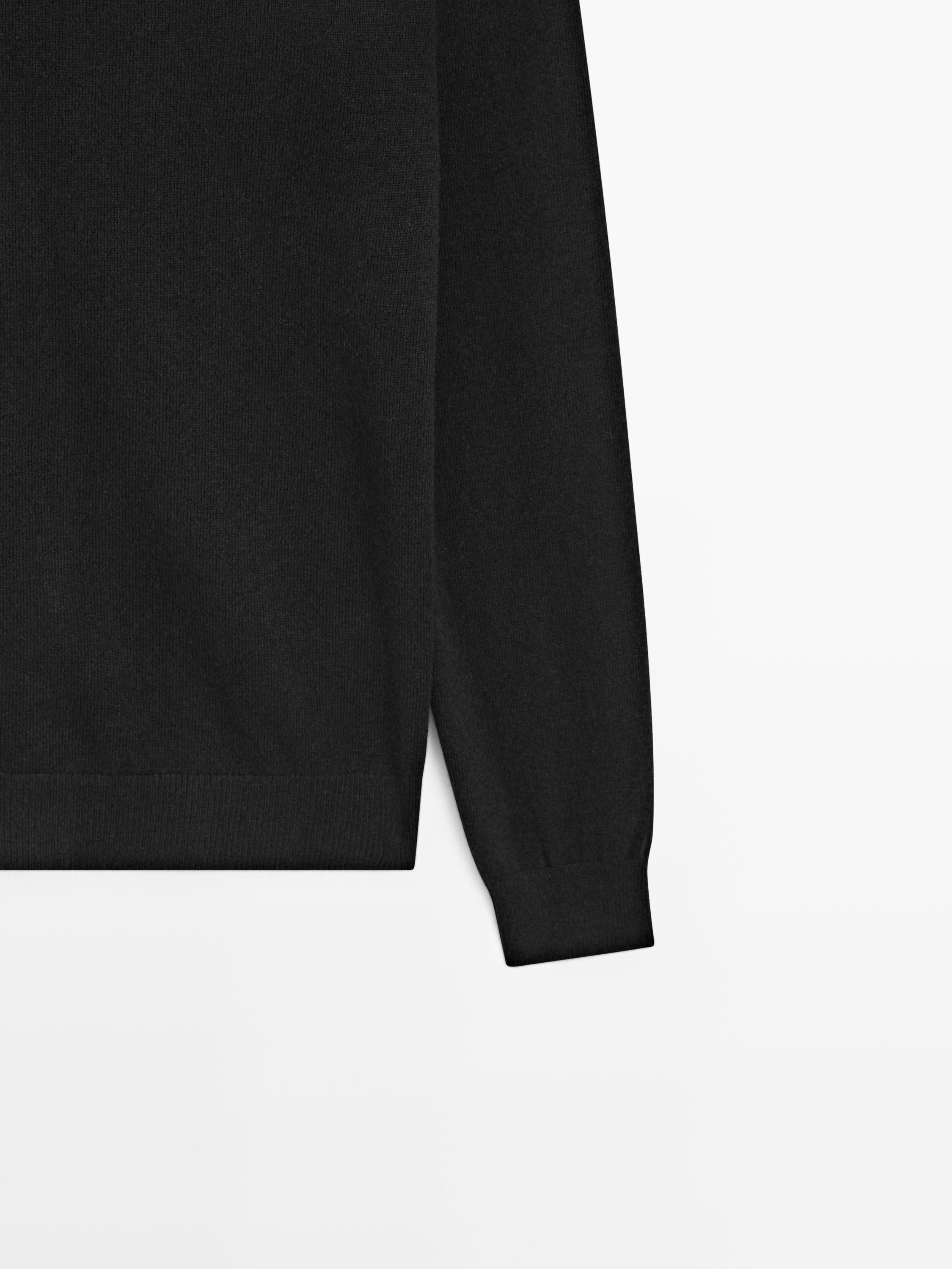 Wool blend knit sweater with high neck